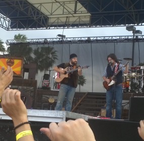 Zac Brown and Clay Cook take the stage with the rest of Zac Brown Band, causing an uproar of singing and dancing throughout the crowd.