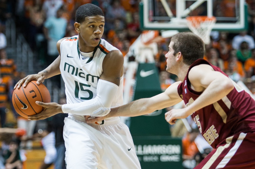 CORAL GABLES, FLA. -- Feb. 5, 2013: Junior guard Rion Brown keeps Boston College defender at bay. (Photo by Zach Beeker)