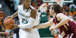 CORAL GABLES, FLA. -- Feb. 5, 2013: Junior guard Rion Brown keeps Boston College defender at bay. (Photo by Zach Beeker)